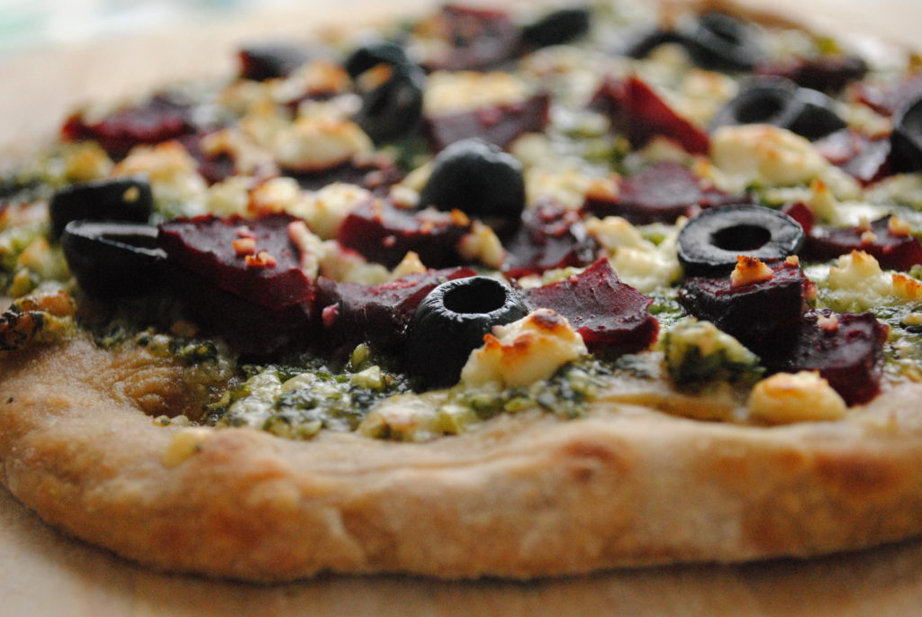 Whole Wheat Winter Pizza with Arugula Pesto and Roasted Beets